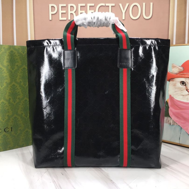 G*u*i shopping bags